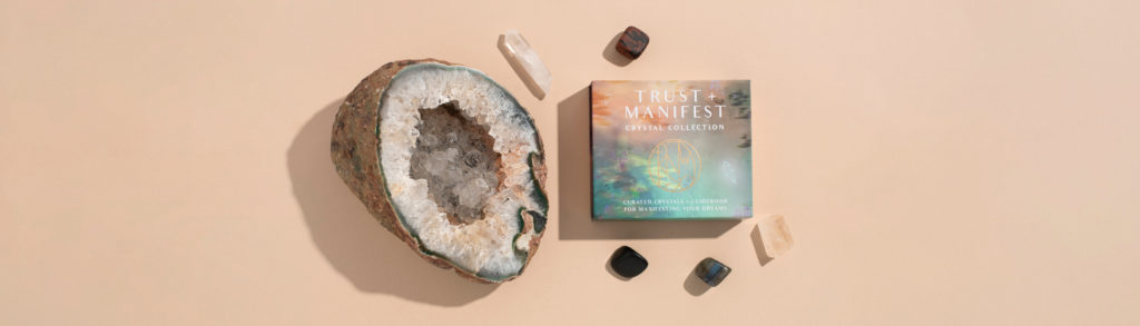 Trust and Manifestation collection with geodes on tan background