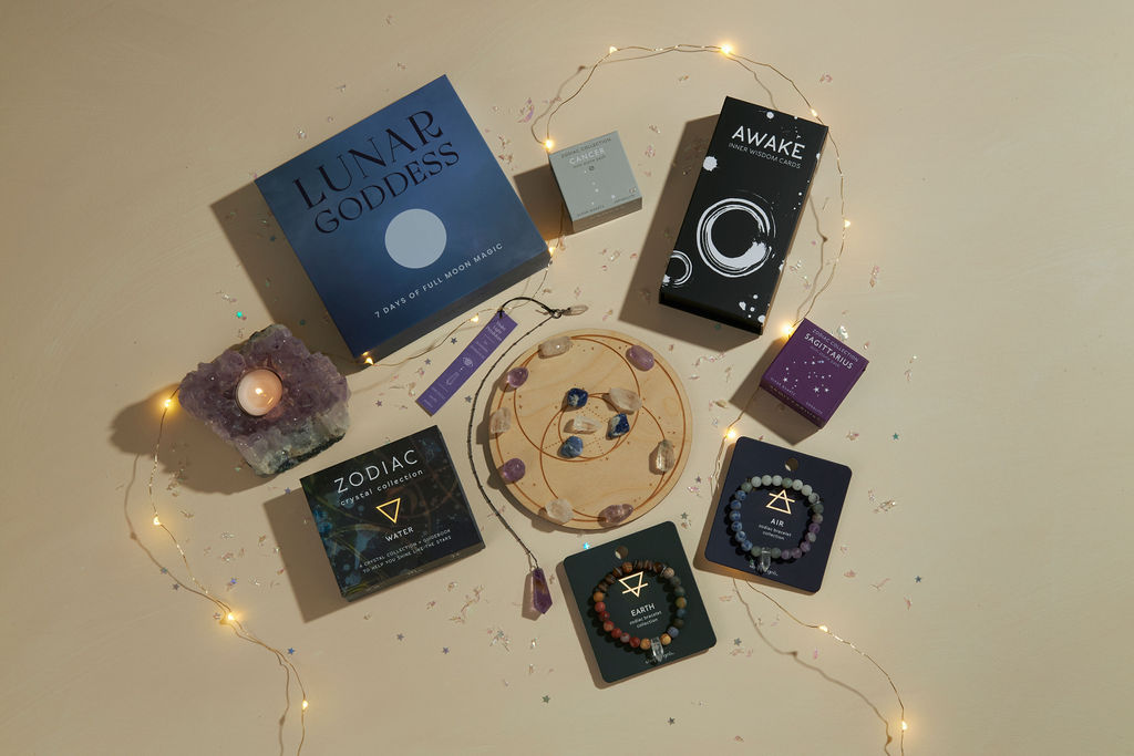 A collection of zodiac themed products: grids, minis, bracelets, full moon kit