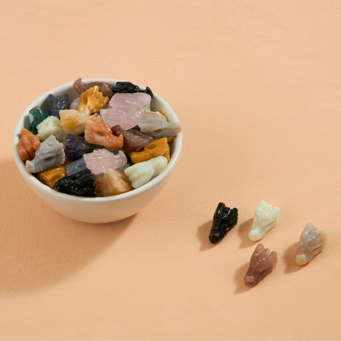 bowl full of a unit of wholesale assorted carved mini crystal dragons