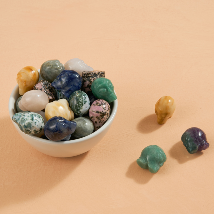 bowl full of a unit of wholesale assorted carved mini crystal aliens