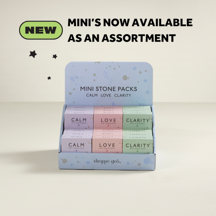 a wholesale display of 18 mini boxed crystal collections: Calm, Love, Clarity. With text: NEW Mini's now available as an assortment.