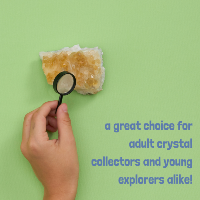 A child's hand using a mini magnifying glass to look at a wholesale citrine cluster with the text "a great choice for adult crystal collectors and young explorers alike!"