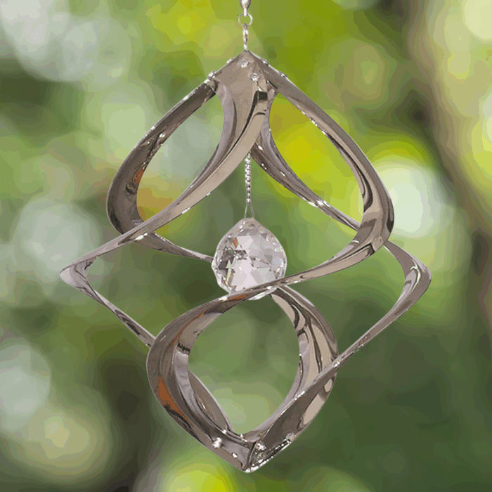 Wholesale hanging garden decor - chrome wind spinner on blurred outdoor background
