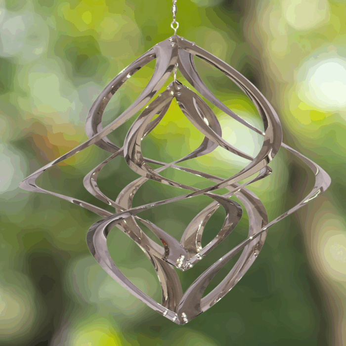 Wholesale hanging garden decor - chrome wind spinner on blurred outdoor background