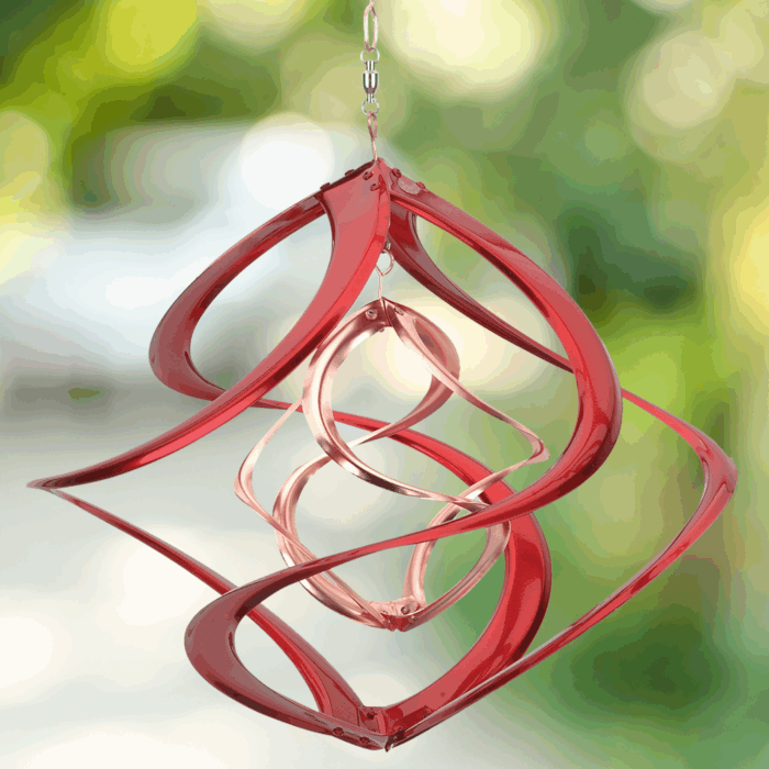 Wholesale hanging garden decor - red and gold wind spinner on blurred outdoor background