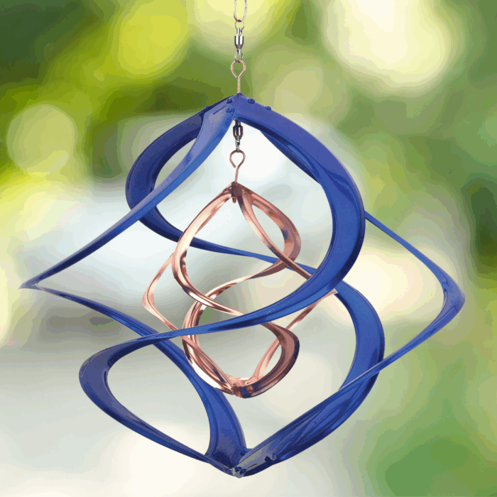 Wholesale hanging garden decor - blue and gold wind spinner on blurred outdoor background
