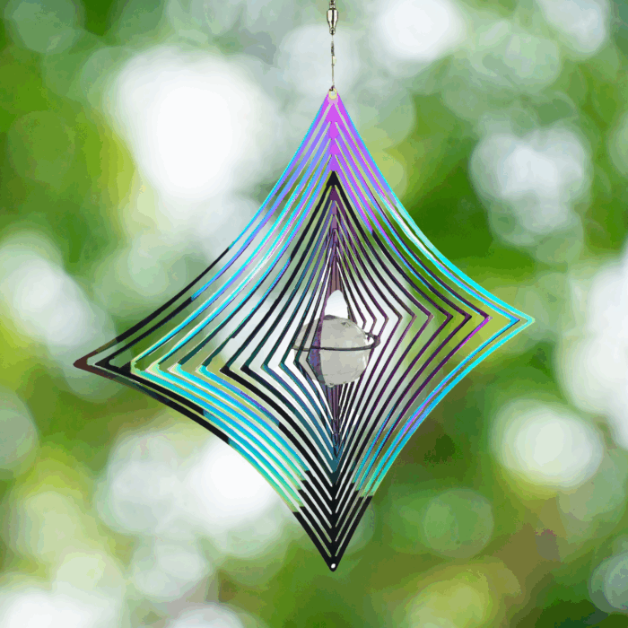 Wholesale hanging garden decor - iridescent wind spinner on blurred outdoor background