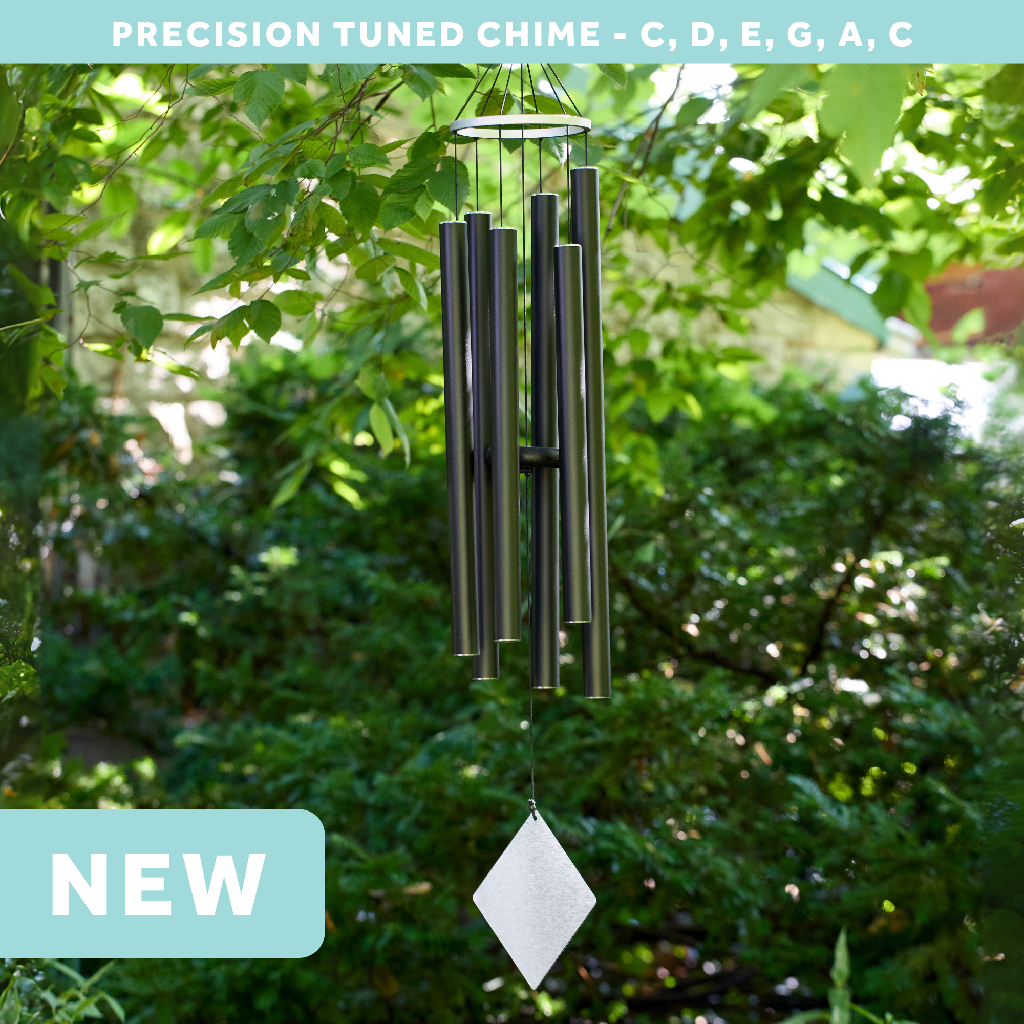 wholesale precision tuned wind chime with a corrosion resistant finish hung outside on a leafy background