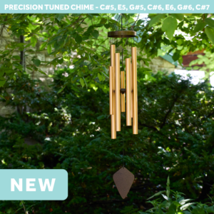 wholesale precision tuned wind chime with a corrosion resistant finish hung outside on a leafy background
