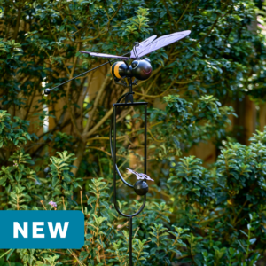 wholesale garden balance rocker featuring a cute bumblebee and flowers on a outdoor background with greenery