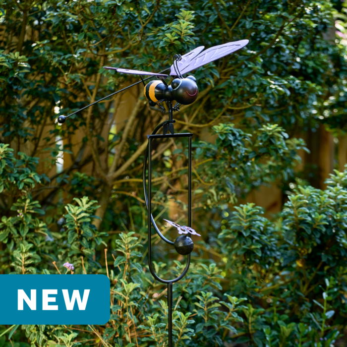 wholesale garden balance rocker featuring a cute bumblebee and flowers on a outdoor background with greenery