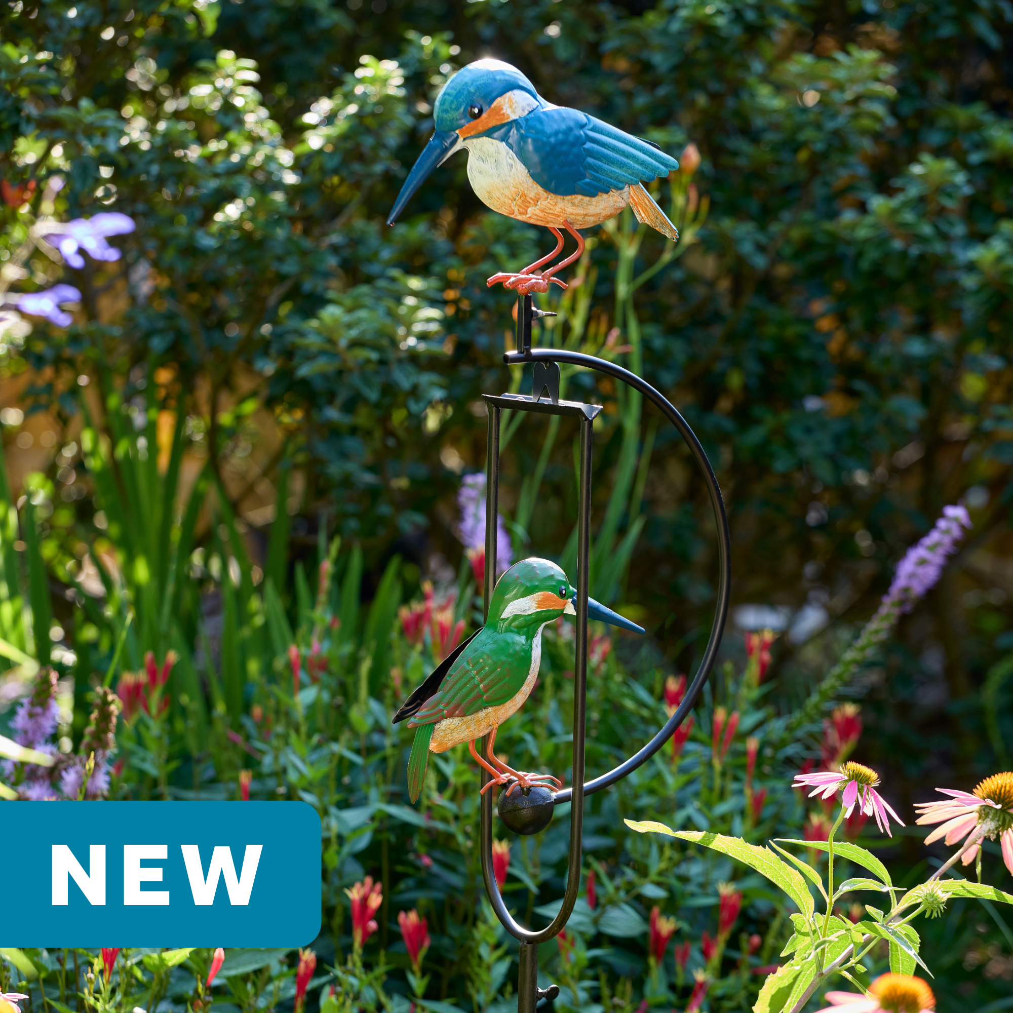wholesale garden balance rocker featuring blue and green hummingbirds on an outdoor background with greenery