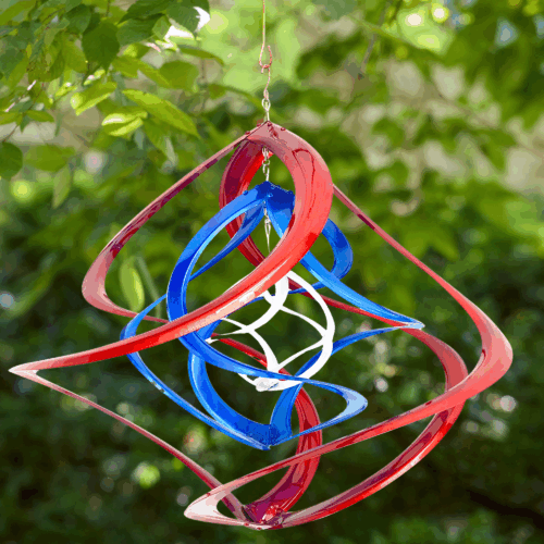 red, white, and blue garden spinner hanging on an outdoor background - wholesale garden.