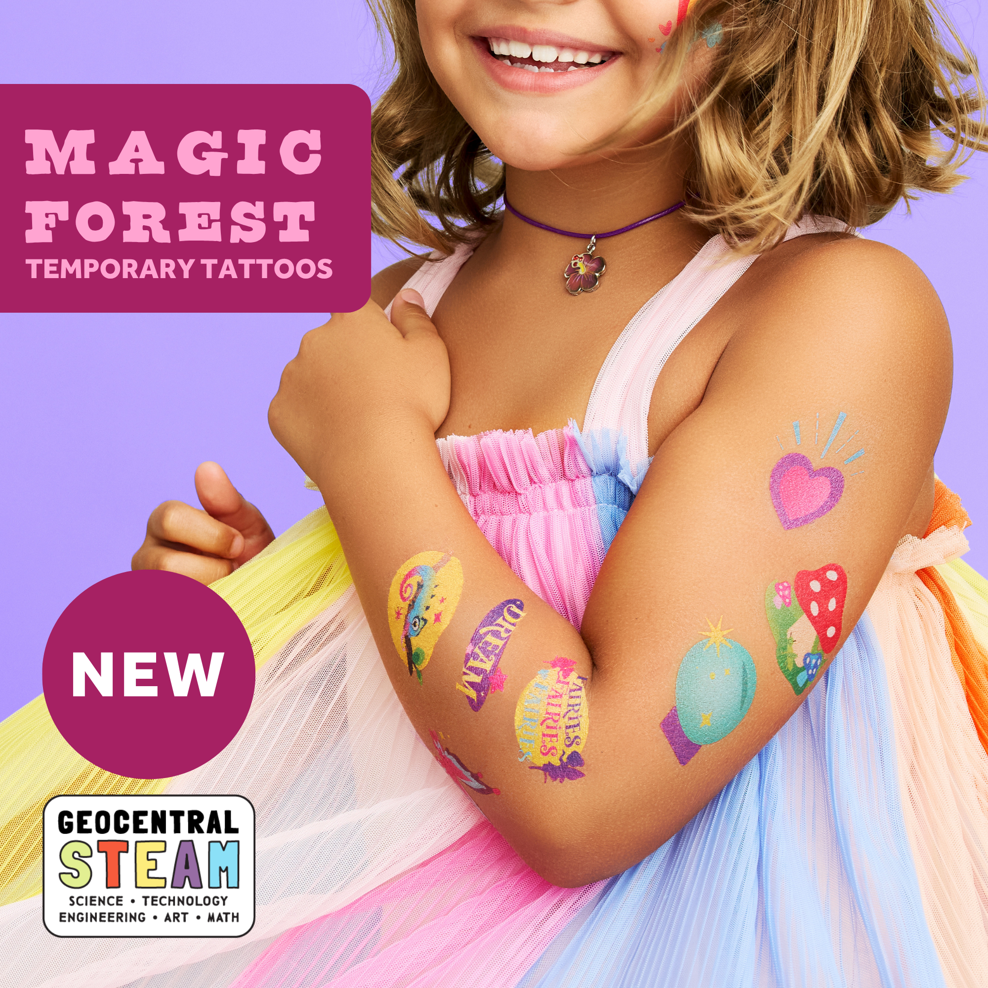 smiling child wearing wholesale fantasy themed kids temporary tattoos - mushrooms, unicorn, fairy wings, fairies, magic potions, gnomes, magic frogs, crystals, dragons, rainbow, magic ball text reads: Magic Forest Temporary Tattoos NEW GeoCentral STEAM
