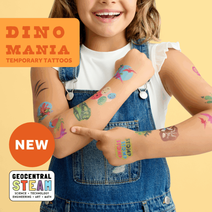 smiling child wearing wholesale dinosaur themed kids temporary tattoos - smiling child wearing wholesale dinosaur themed kids temporary tattoos - pterodactyl, t-rex, brachiosaurus, Styracosaurus, stegosaurus, fossils, volcanoes, footprints, flora and fauna text reads: Dino Mania Temporary Tattoos NEW GeoCentral STEAM