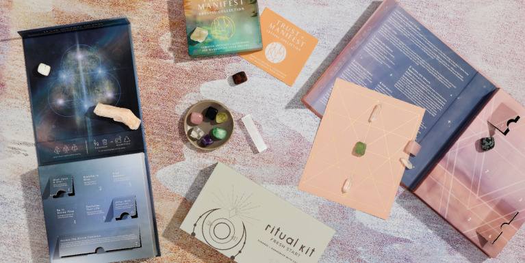 boxed crystal collections on a pink and purple background - lunar goddess, ritual kit, cleanse and elevate