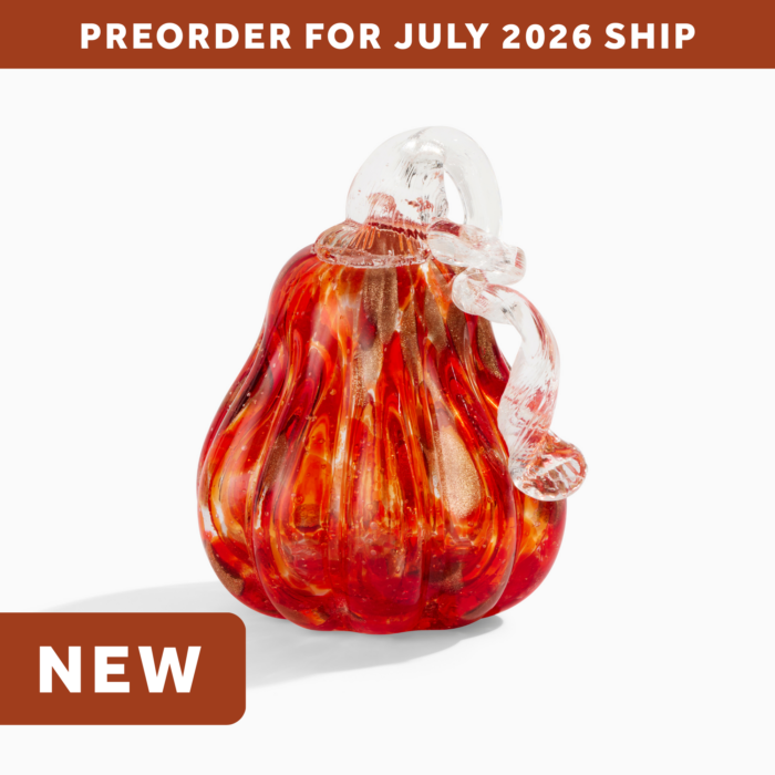 wholesale glass pumpkin with gold glitter accents and a curly clear glass stem. text on the image says: preorder for july 2026 ship. NEW.