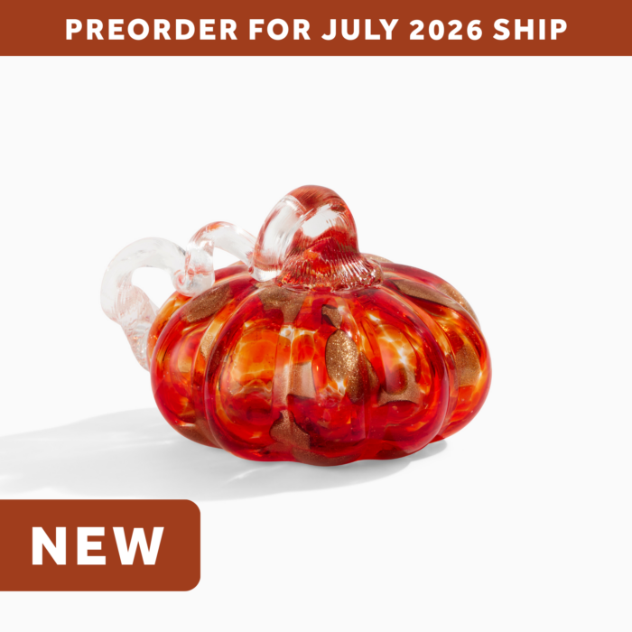 wholesale glass pumpkin with gold glitter accents and a curly clear glass stem. text on the image says: preorder for july 2026 ship. NEW.