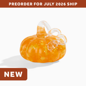 wholesale halloween glass pumpkin with gold glitter accents and a curly clear glass stem. text on the image says: preorder for july 2026 ship. NEW.