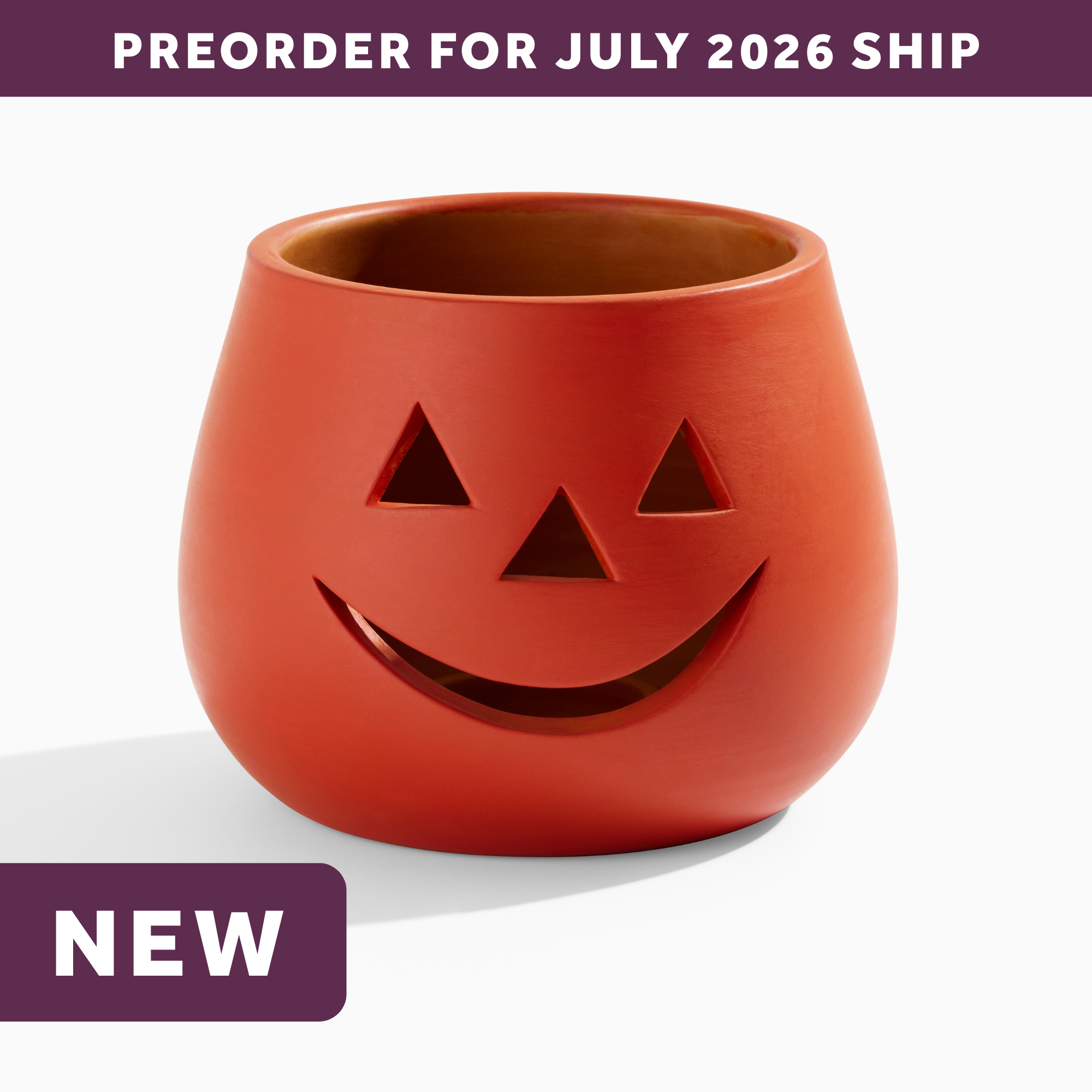 wholesale halloween orange clay jack o lantern candle holder featuring a smiling face with triangle eyes and a triangle nose. text says: preorder for july 2026 ship. NEW.